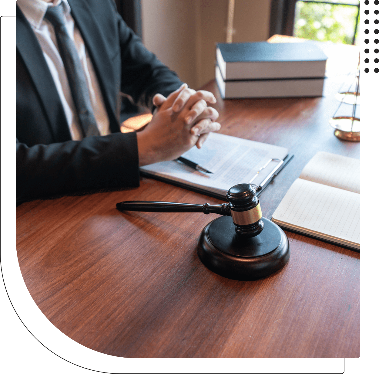 Judge's gavel on a wooden desk.
